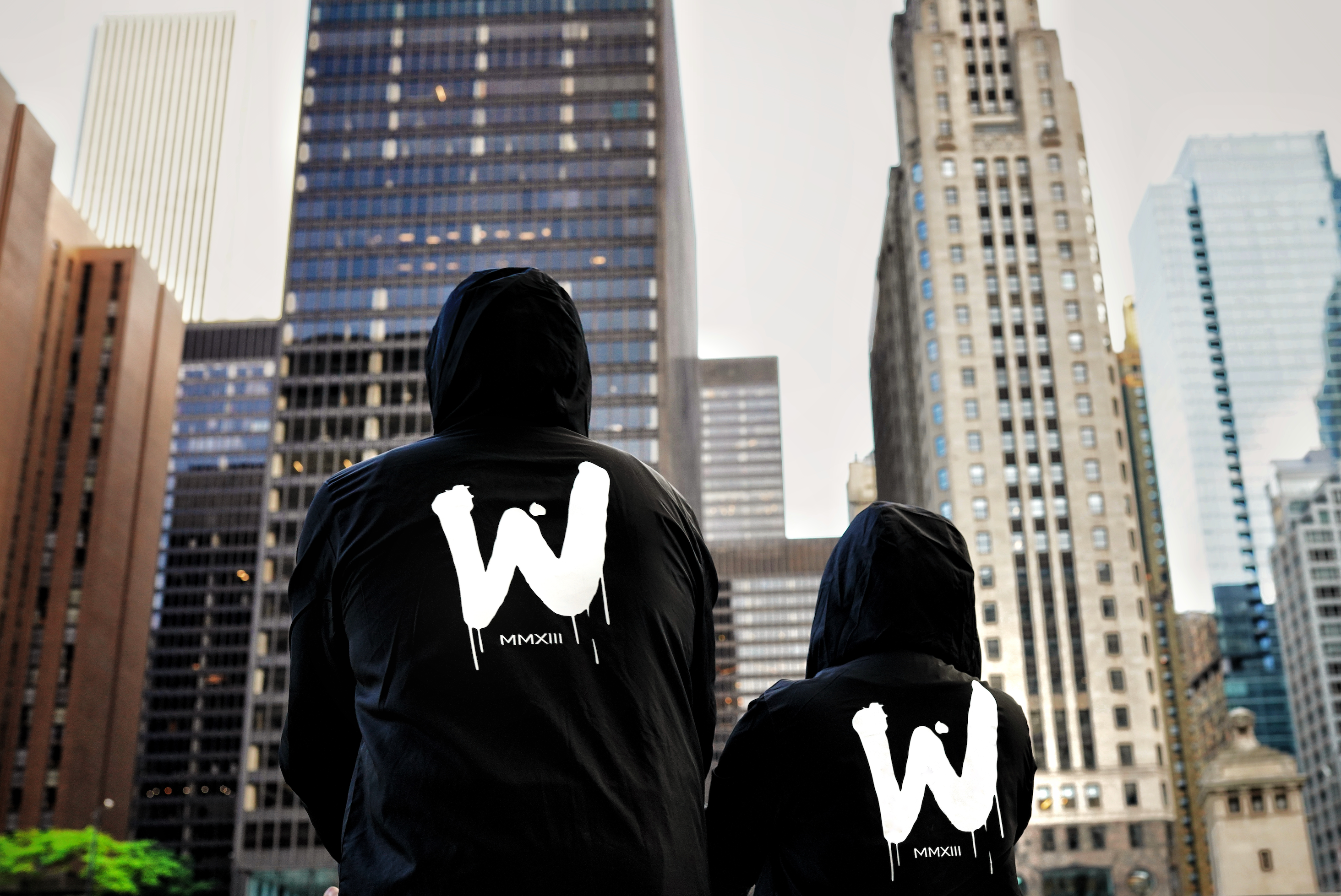 two people with the wavy boy drippy w jackets on , facing the Chicago skyline, Windbreaker, Wavy Windbreaker, Drippy W Windbreaker, Drippy W jacket, Streetwear jacket, streetwear clothes , luxury streetwear, drip, summer , summer vibes, raincoat, Drip, Wavy, Mens jacket, women's jacket, unisex jacket, #wavyboyclothing, wavy boy clothing, swagger, style, streetstyle, Chicago, portland, cindes rooftop Chicago, Chicago streetwear, streetwear brand, Chicago streetwear , made on the moon